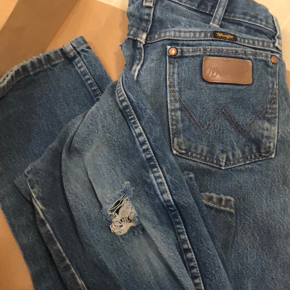Worn out vintage blue wrangler